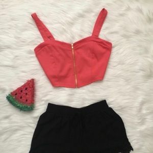 Coral crop top with zipper.